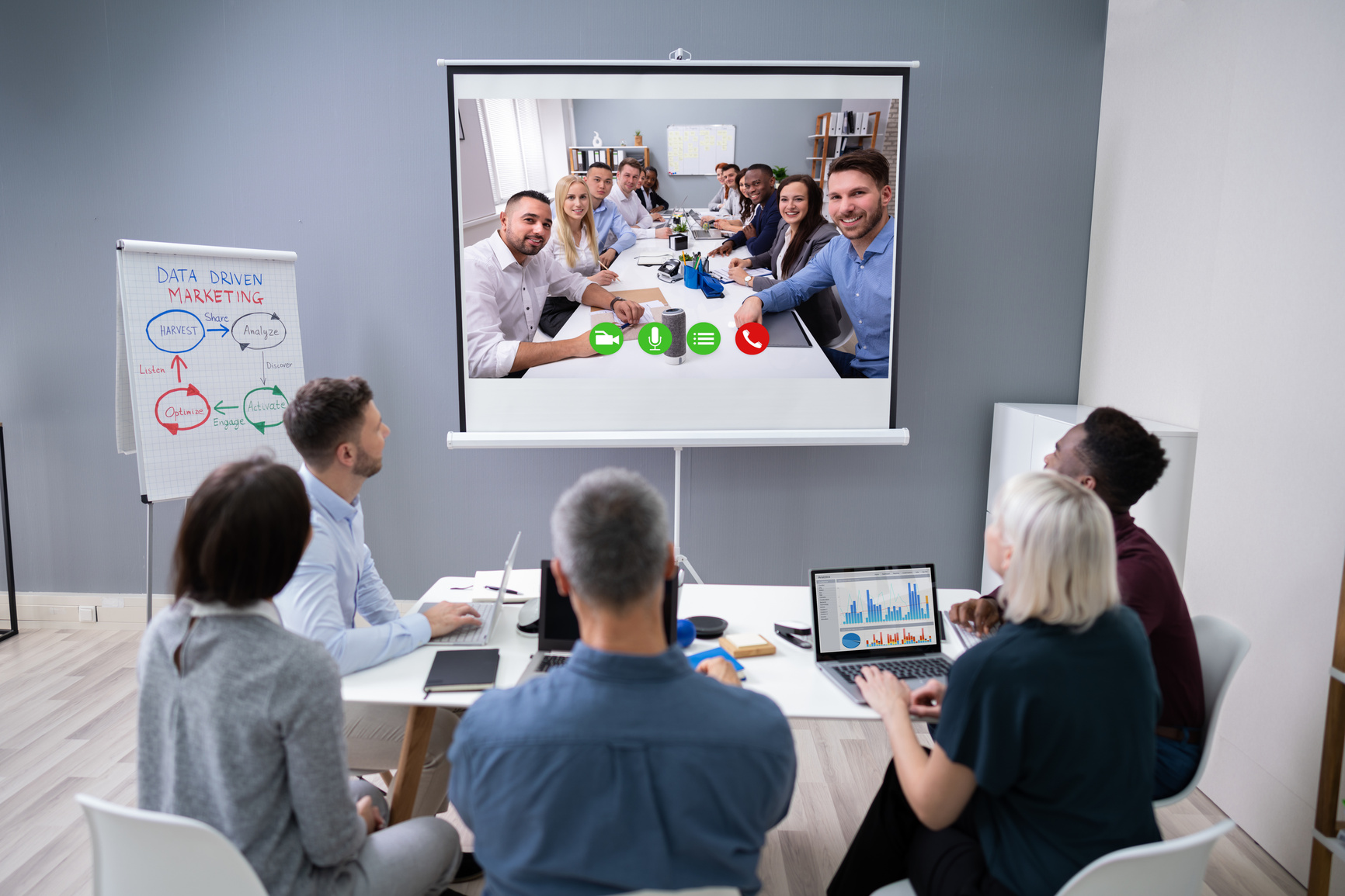 Colleague Doing Video Conferencing In Office